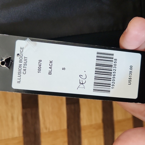 NWT!! Bebe catsuit zip back open back - Picture 11 of 12